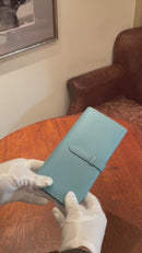 [French calf] <br>Long wallet with belt<br>color: Aqua Blue